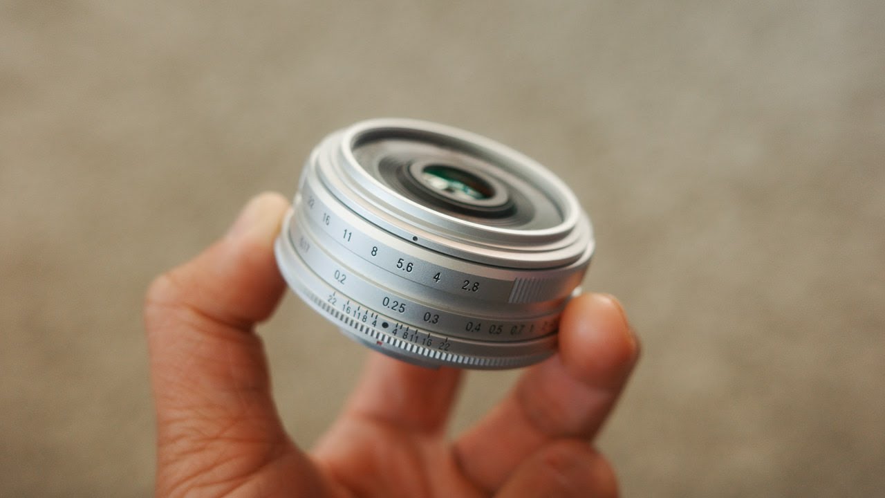 YouTube post by @Reggiebphoto for Moment. Caption reads: This Fuji lens needs more love..