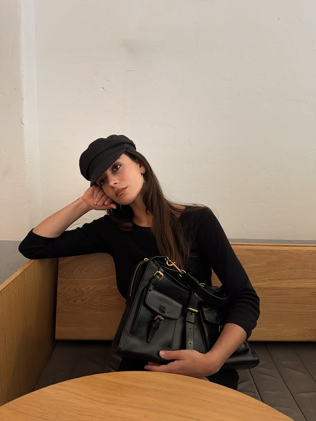 Instagram post by @char_argyrou for Mulberry. Caption reads: Never not by my side, the Roxanne by....