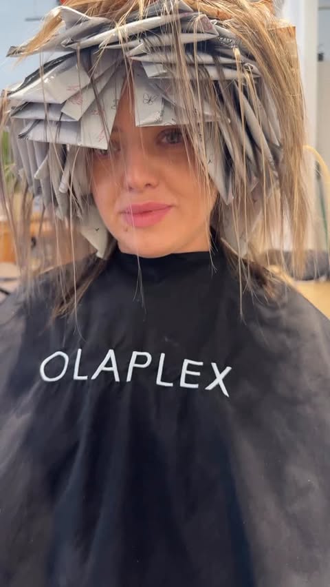 Instagram post by @danilo.bozic for OLAPLEX. Caption reads: [...] toners 💪 Hair care goes to @olaplex ✨....