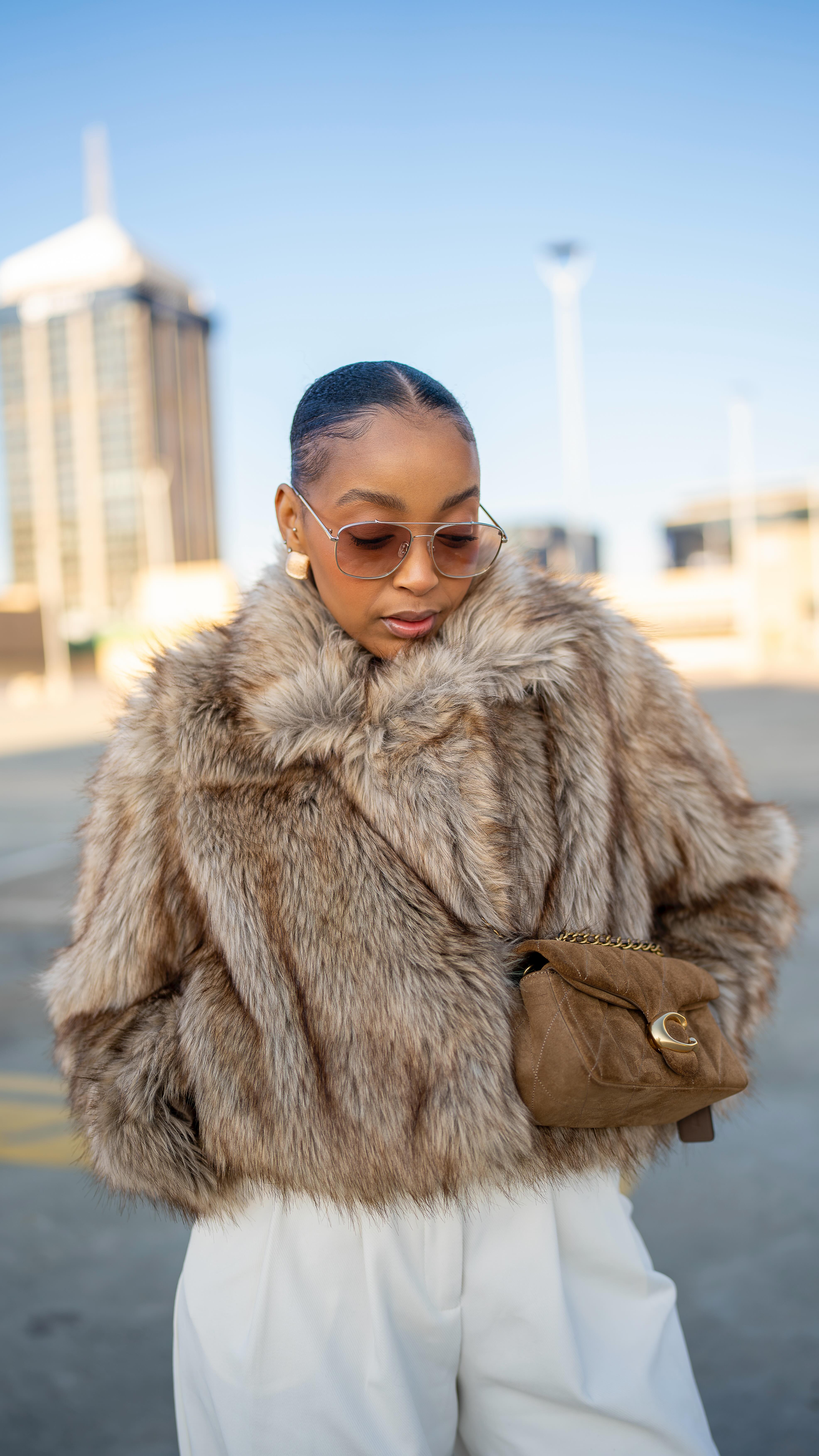 Instagram post by @dimamthini for Ted Baker. Caption reads: [...] ✨

Styled this stunning cardigan from....