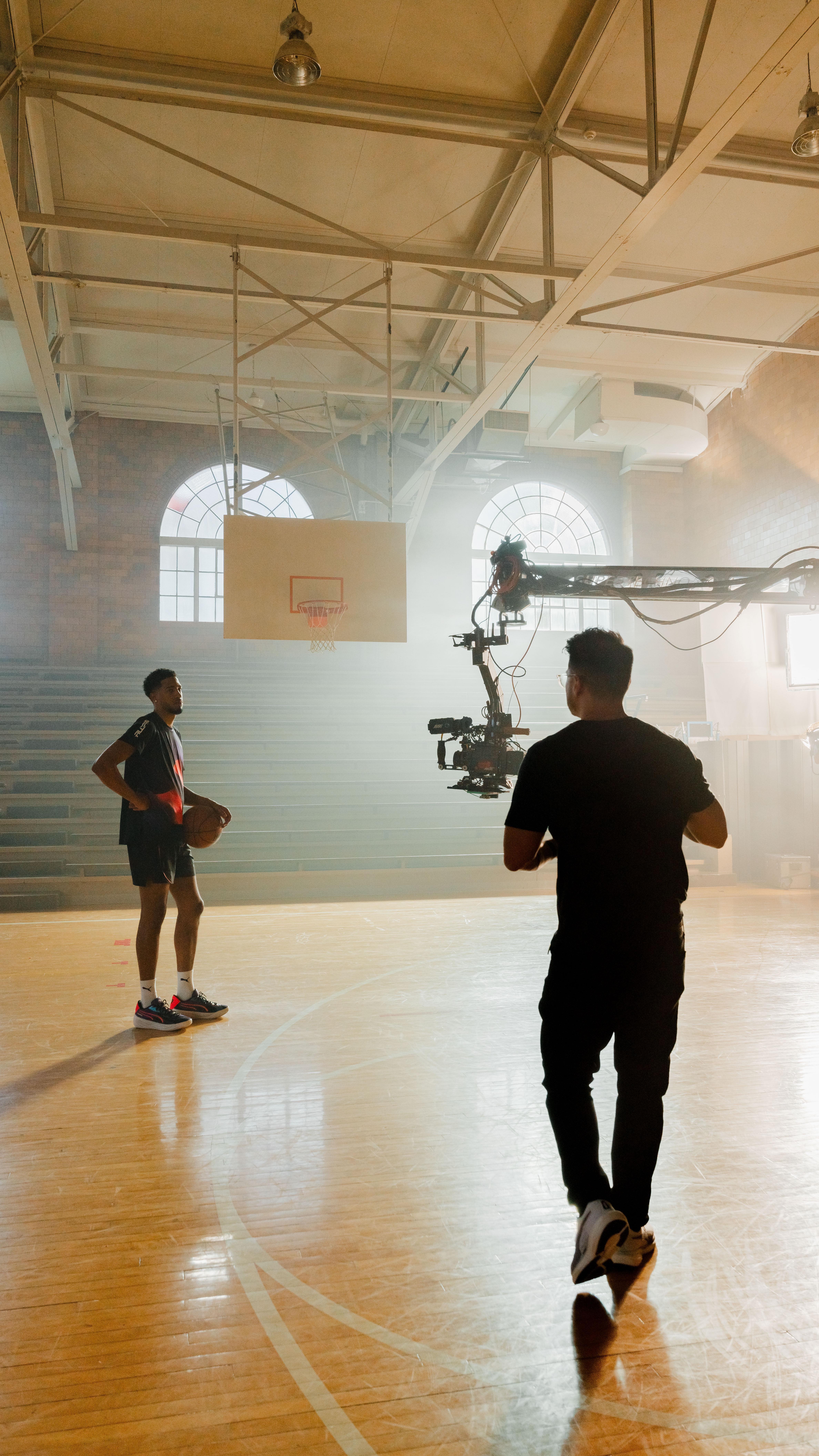 Instagram post by @natprinzi for PUMA Basketball. Caption reads: BTS of our @pumahoops spot with @tyresehaliburton.....