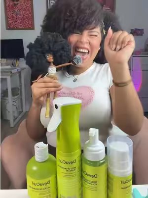 TikTok post by @totally_nath for DevaCurl. Caption reads: Mi amor ellos no me fallan 🔥 @DevaCurl✅....