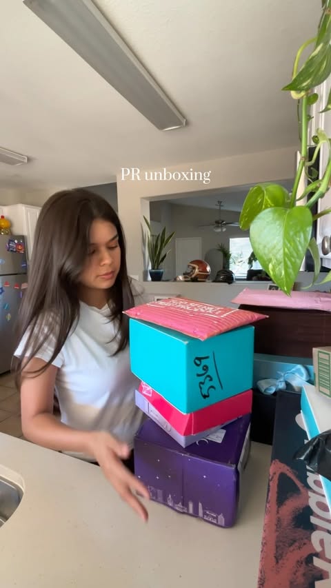 Instagram post by @_lezz_lee for Moroccanoil. Caption reads: PR haul/unboxing!! Thank you to all the amazing....