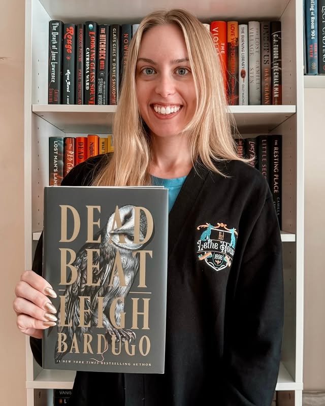 Instagram post by @clairevoyantbooks for Flatiron Books. Caption reads: Happy pub day to DEAD BEAT by Leigh Bardugo 🥳 Q:....