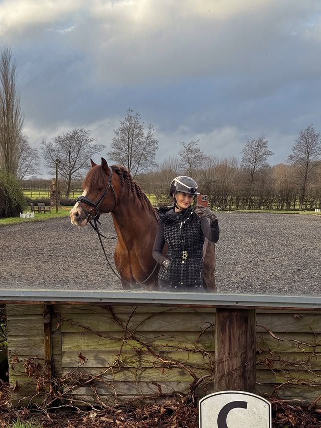 Instagram post by @scarletmartin_ for Charles Owen. Caption reads: time spent in the saddle is time very well spent....