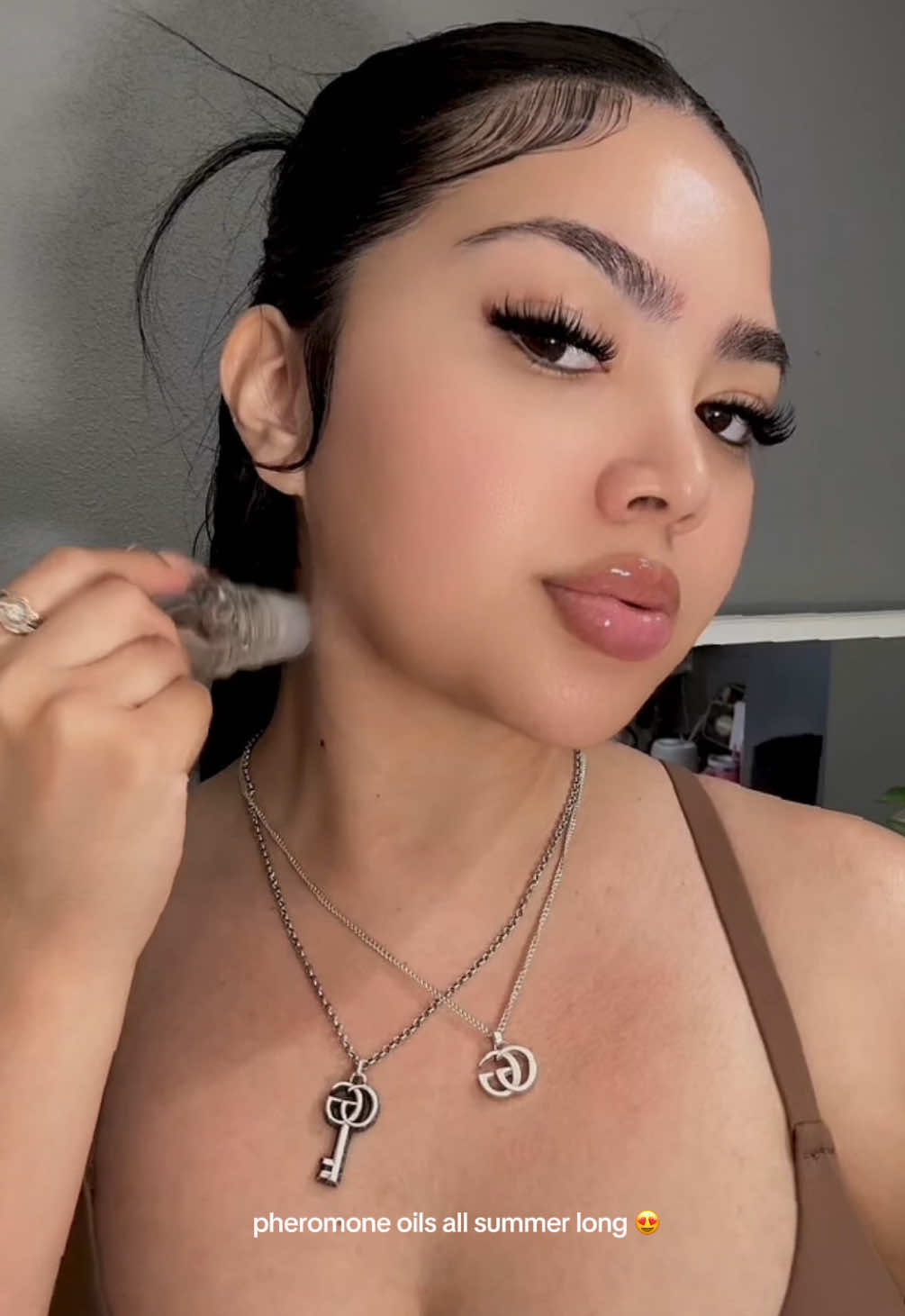 TikTok post by @shesbeenchill for DLA COSMETICS. Caption reads: I’m obsessed @DLA COSMETICS pheromone oils 😍✨....