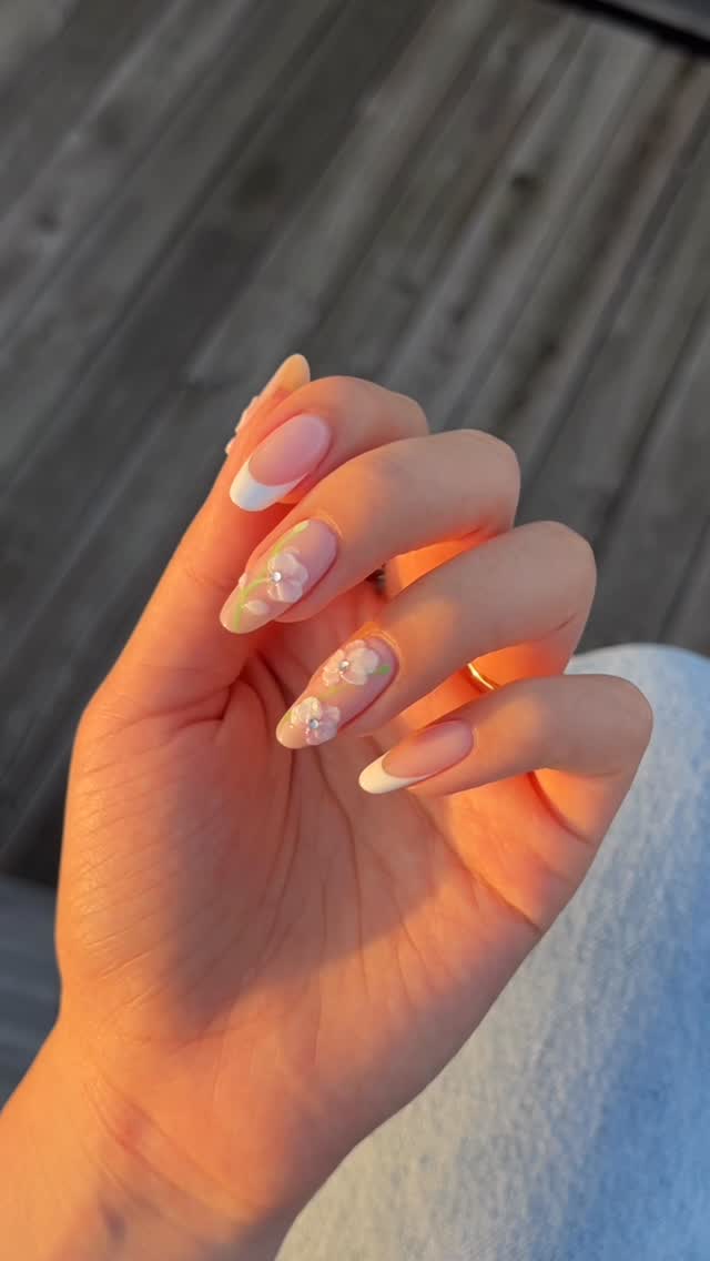 Instagram post by @heluviee for GLAMIRA. Caption reads: cute lil orchids <3🌸 to match the oriental notes....