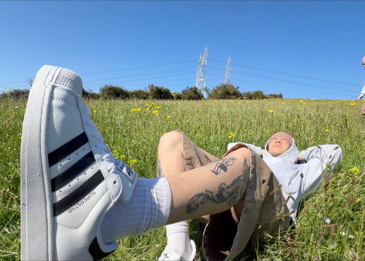 Instagram post by @nachoferrero for Foot Locker. Caption reads: having fun with my adidas Superstar!⭐️ #ad.