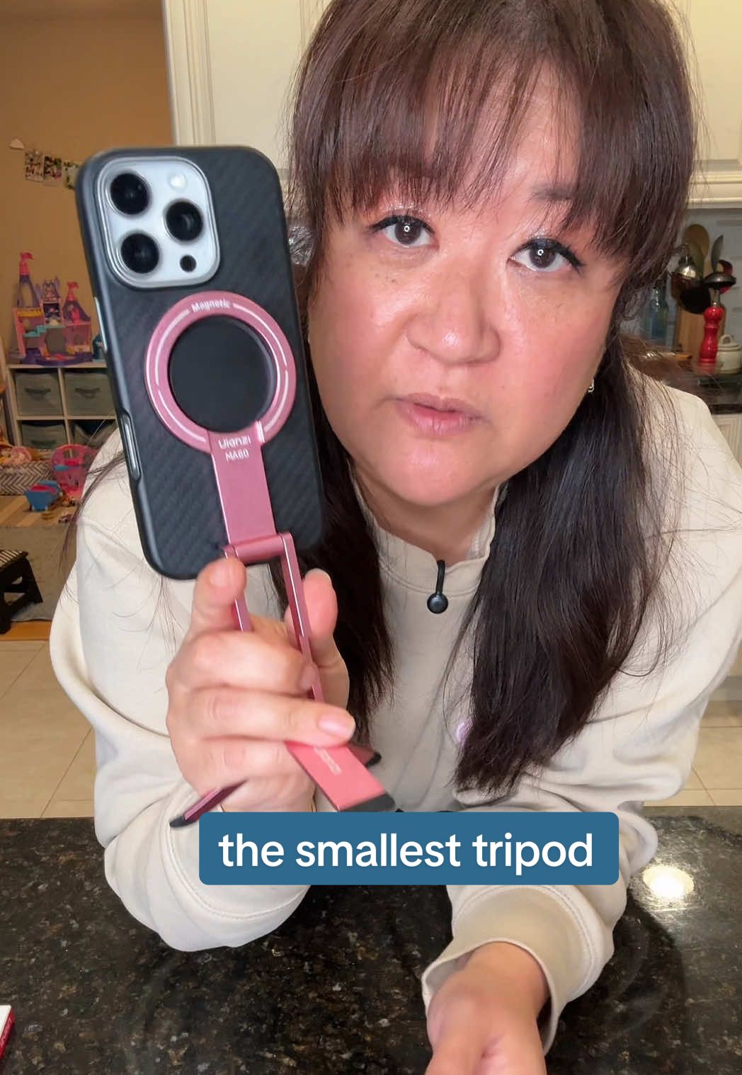 TikTok post by @chefjulieyoon for Ulanzi. Caption reads: [...] this pretty metallic pink color too....