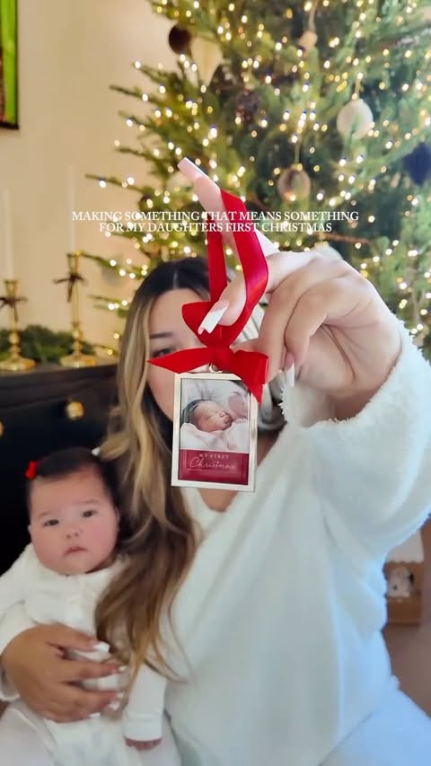 Instagram post by @britneydelsol for Shutterfly. Caption reads: [...] baby girl’s first christmas through....
