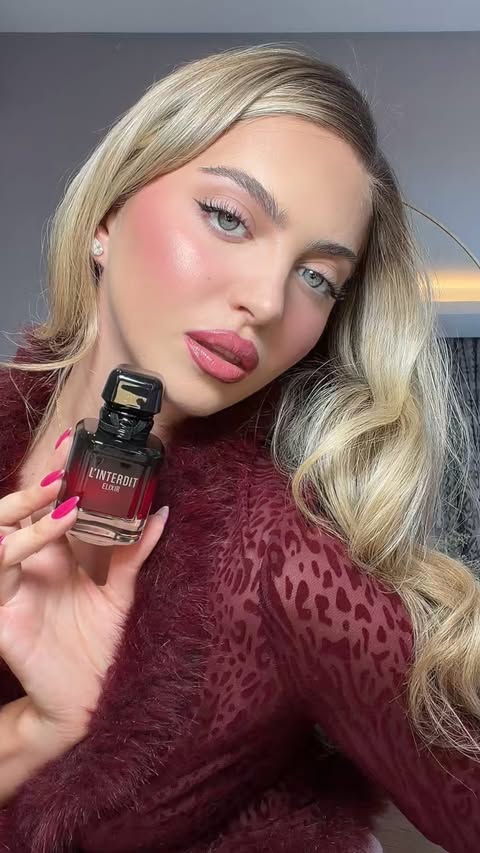 Instagram post by @annabellehoy for Givenchy Beauty. Caption reads: [...] a new plus one 🍒 L’Interdit Elixir....