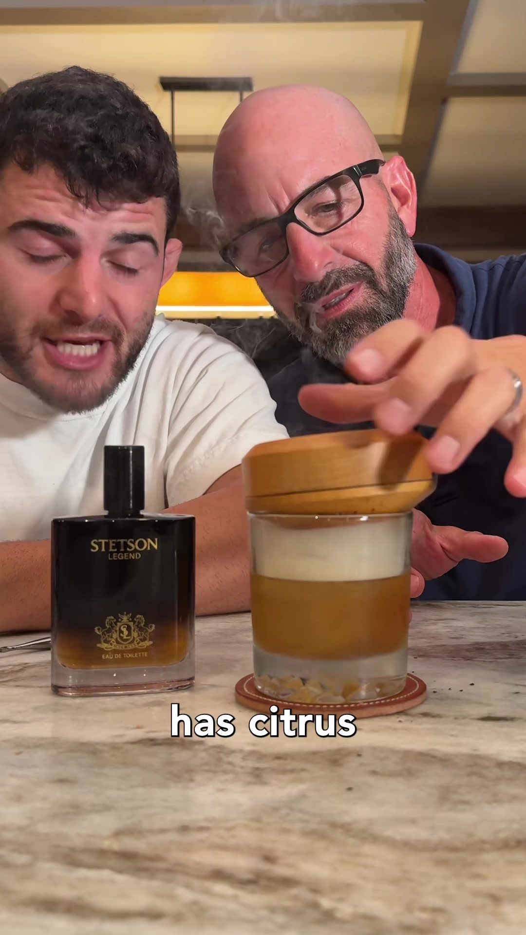 TikTok post by @johnrondi for Stetson. Caption reads: A drink as smooth as Stetson Legend Cologne 🥃 ....