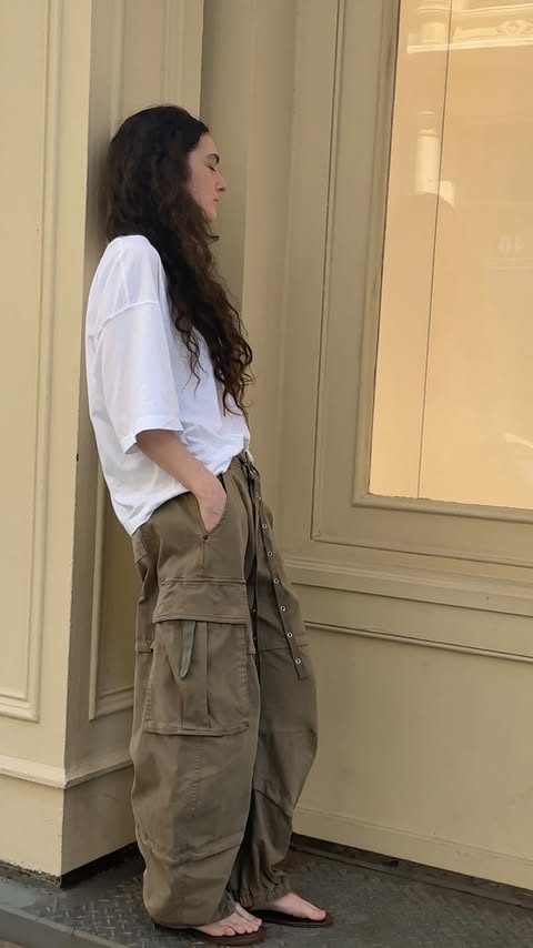 Instagram post by @emilybonita for Free People. Caption reads: [...] makes getting dressed so much easier.....