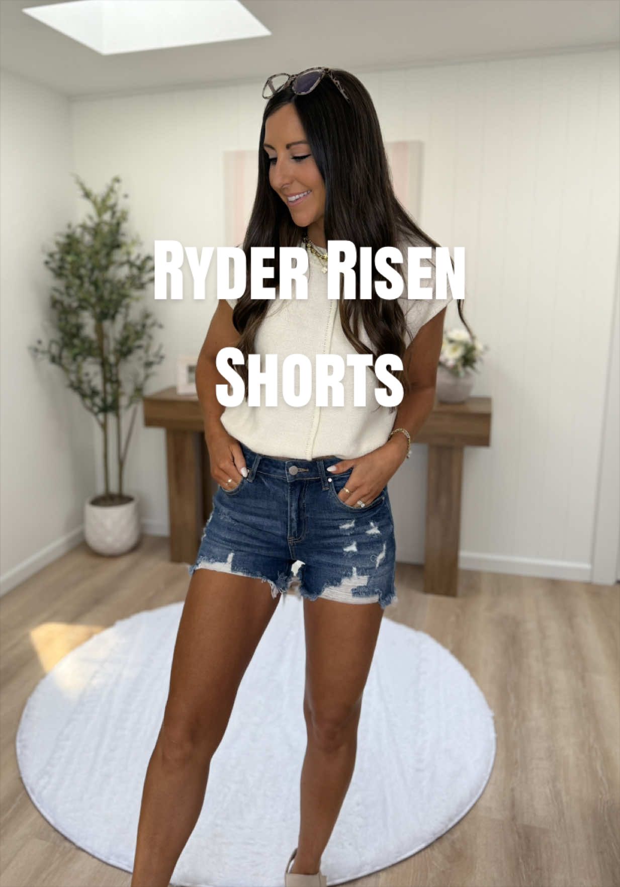 TikTok post by @shawna.likes2shop for Wild Oak Boutique. Caption reads: [...] My favorite Risen shorts 😍 @Wild Oak....