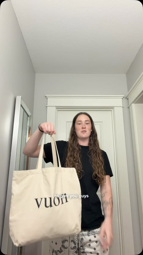 Instagram post by @addy_brown24 for Vuori. Caption reads: this month’s vuori haul is 🔥 @vuoriclothing....