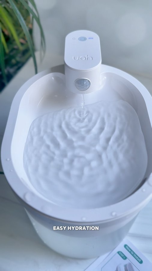 Instagram post by @skindeep_sara for Uahpet. Caption reads: UAH Pet Wireless Water Fountain with Motion Sensor....