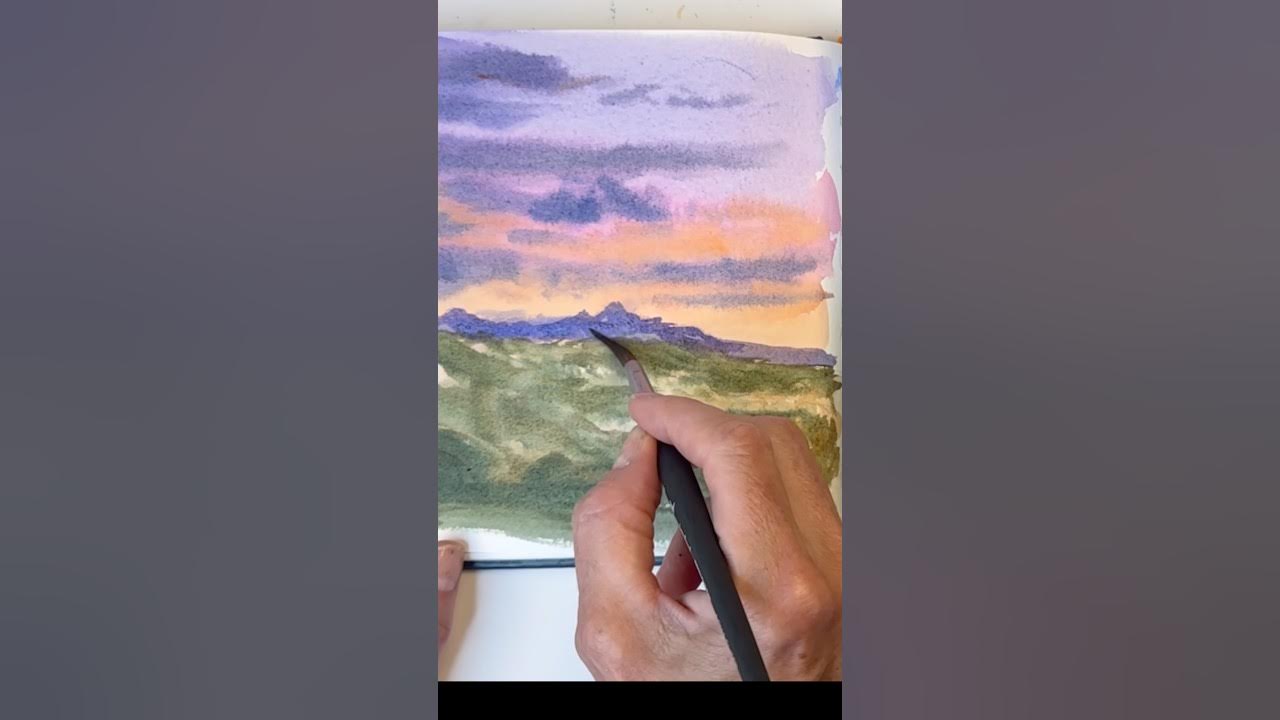 YouTube post by @ellencrimitrent for Pexels. Caption reads: EASY watercolor colorful sky/ sunset #watercolor.