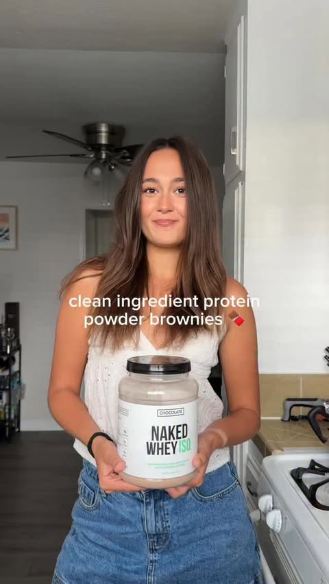 Instagram post by @juliabouvierr for Naked Nutrition. Caption reads: [...] to the protein powder I’m using! 🤎....