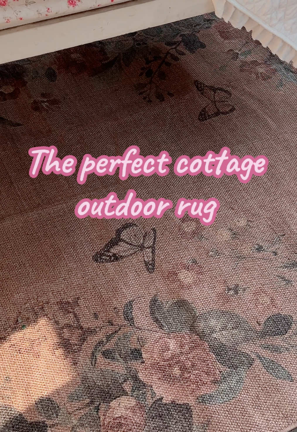 TikTok post by @myfrillyfarmhouse for LA Home Decor. Caption reads: A cottage farmhouse dream rug! #rug #outdoorrug....