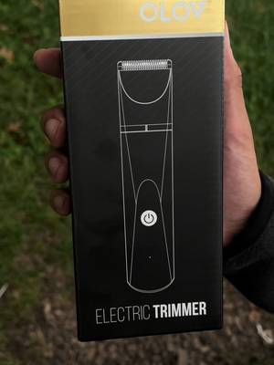TikTok post by @ashley.nextdoor for OLOV. Caption reads: @OLOV Your New Go-To Electric Trimmer for Easy,....