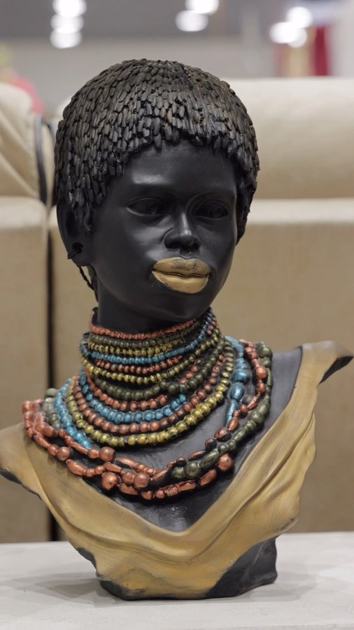 Instagram post by @ritrisha.official for Royaloak Furniture. Caption reads: Elevate your home with Royaloak Furniture in....