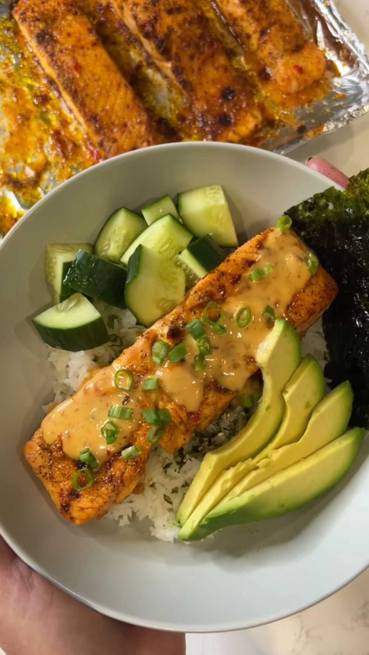 Instagram post by @christycooks_ for Reynolds Brands. Caption reads: Bang Bang Salmon Recipe 

#ReynoldsPartner This is....