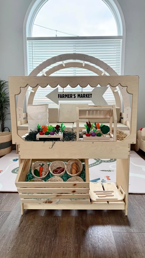 Instagram post by @lianijem for PlanToys. Caption reads: Because who doesn’t love a farmers market + a....