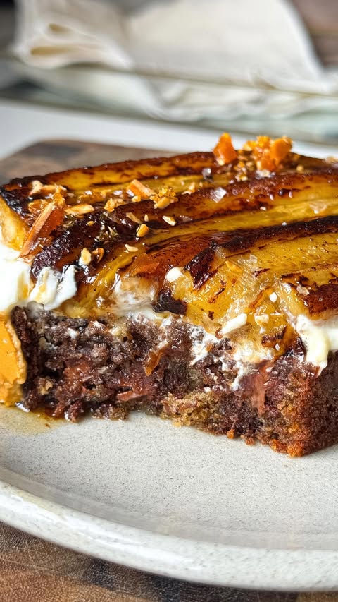 Instagram post by @melies_kitchen for Panasonic New Zealand. Caption reads: Soft, moist banana bread, big puddles of melted....