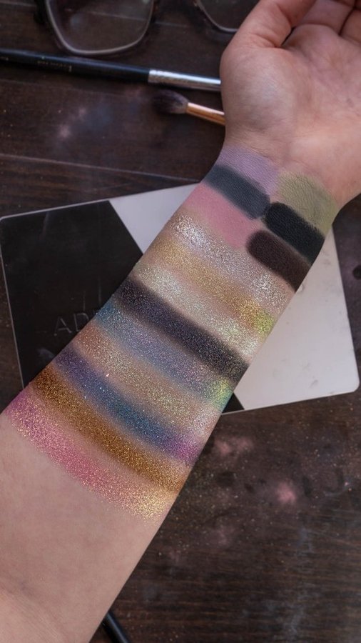 Instagram post by @facesbygina for Adept Cosmetics. Caption reads: Swatches for the Adept Cosmetics Emo Palette! More....