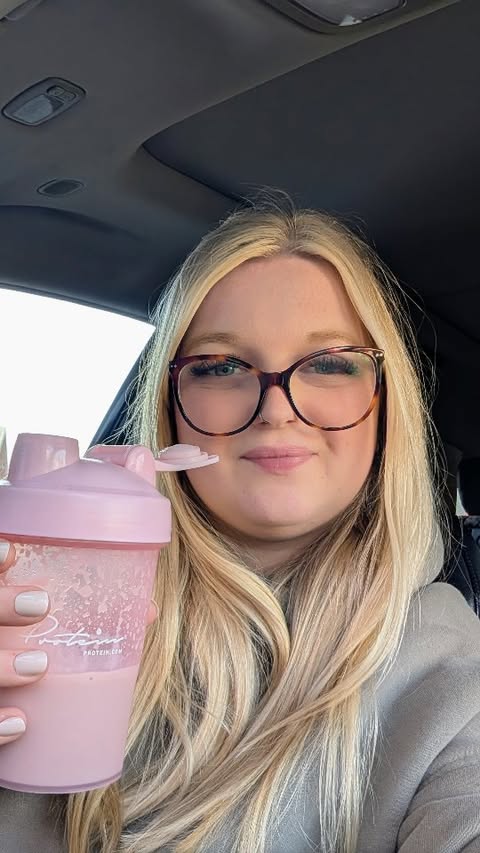 Instagram post by @amie_plus_three for Protein.com. Caption reads: Make my shake with me😋 Iced cappuccino flavour....
