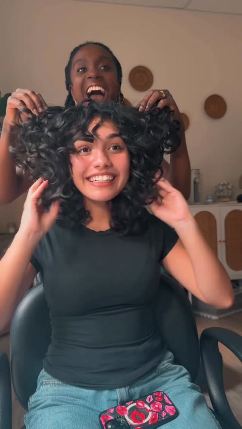 Instagram post by @reginarothcurls for BounceCurl. Caption reads: Let this be your sign: You don’t always need....