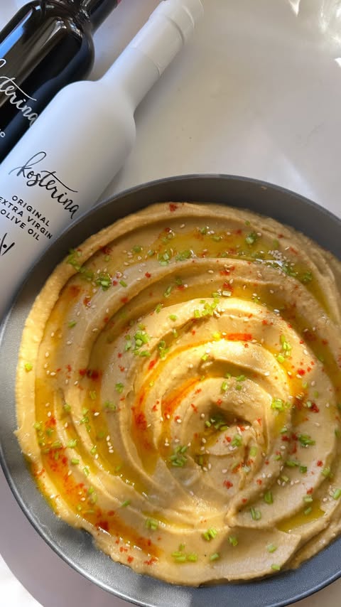 Instagram post by @thehomelyshef for Kosterina. Caption reads: [...] the most-simple dishes. Each bottle of....