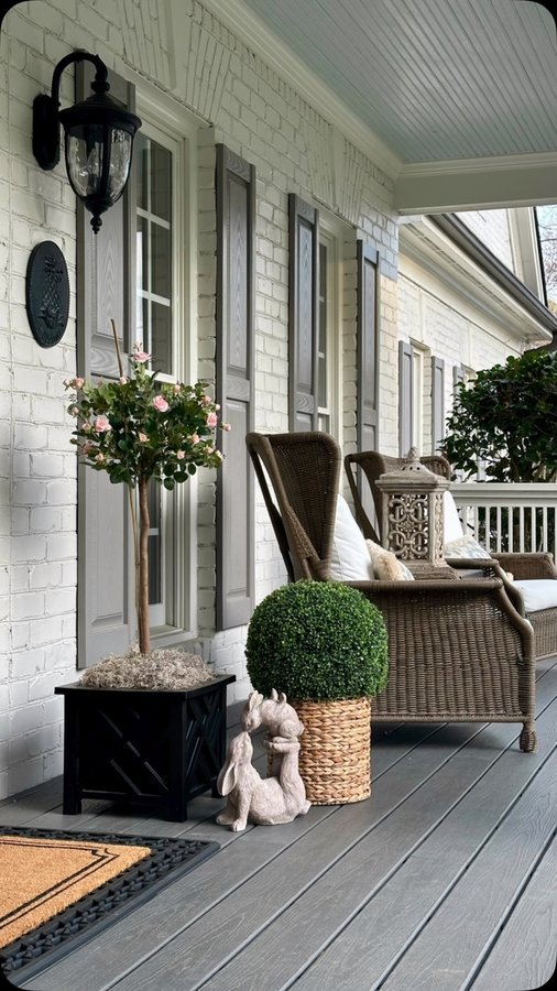 Instagram post by @southern_charm_cottage for Nearly Natural. Caption reads: [...] rose topiaries and boxwoods from....