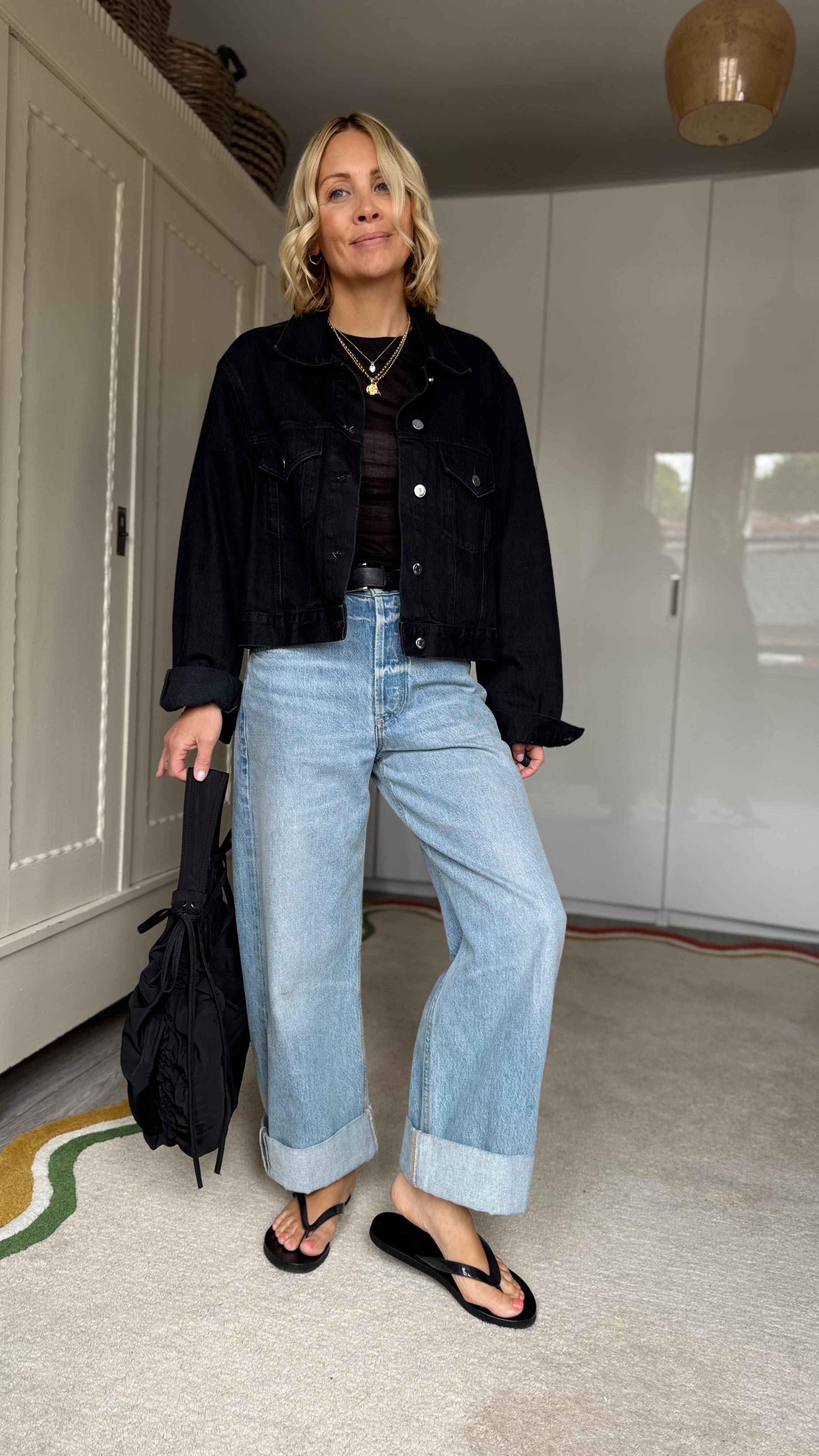 Instagram post by @ashley.dainty for Monki. Caption reads: Happy Friday 🫶🏻 an outfit with my fave pair of....