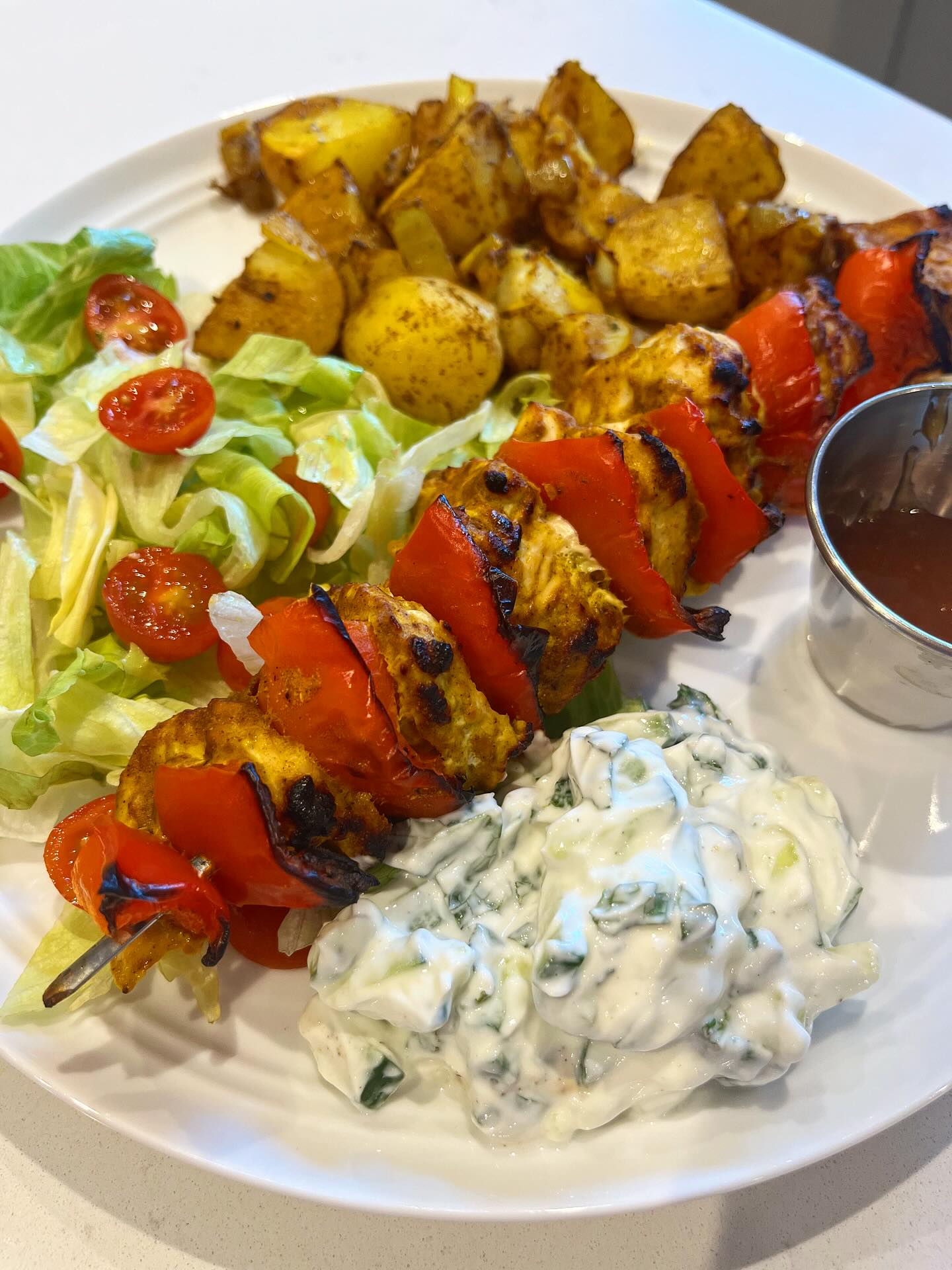 Instagram post by @foodandfitness_kirstylee for Jd Seasonings. Caption reads: ✨ Chicken Tikka Skewers & Bombay potatoes.
.
✨....