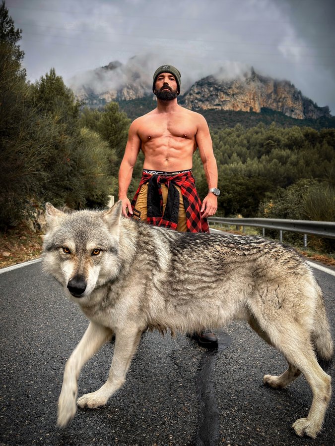 Instagram post by @wolf_instinct for RevolutionRace. Caption reads: Wherever I go, you are my shadow. Wherever you....