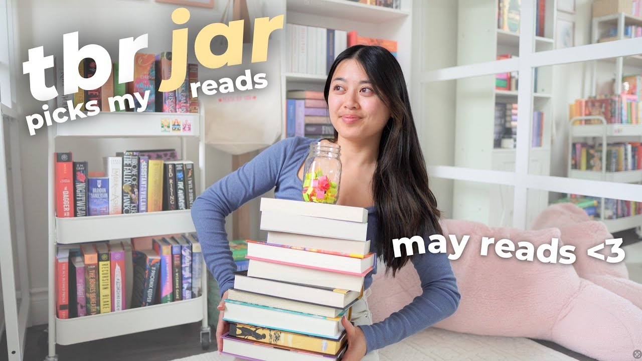 YouTube post by @jaimefok for BookoftheMonth. Caption reads: *TBR JAR* chooses my May reads 📚💕🌸.