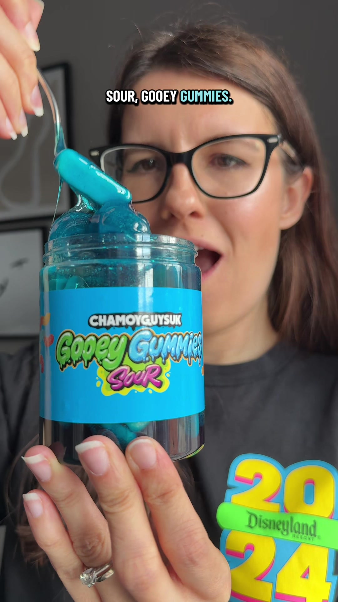 TikTok post by @violet.hollow for ChamoyGuysUK. Caption reads: Sour Gooey Gummies 💙 @ChamoyGuysUK #bluesweets....