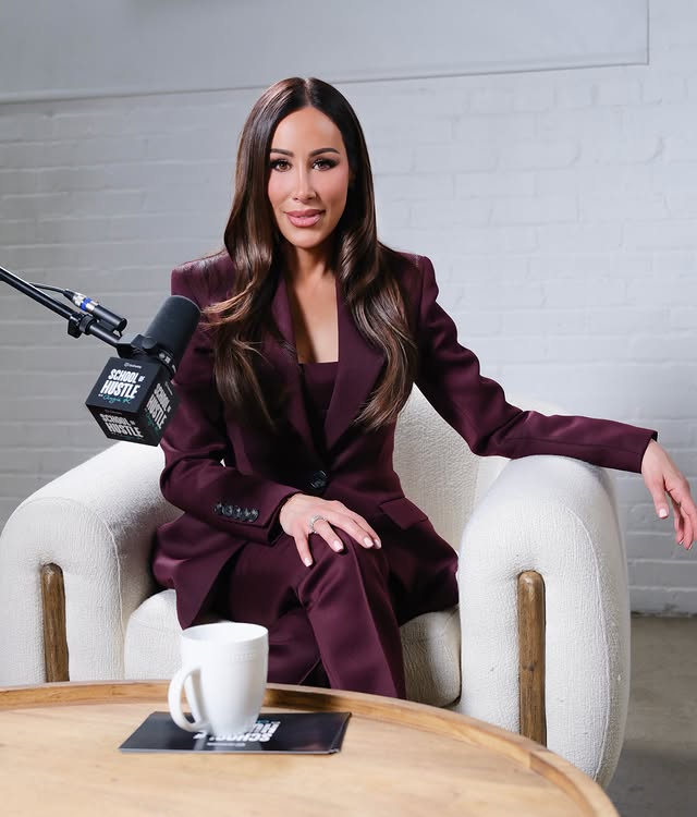 Instagram post by @angiekatsanevas for GoDaddy. Caption reads: [...] secretly working on… I’m hosting the GoDaddy....