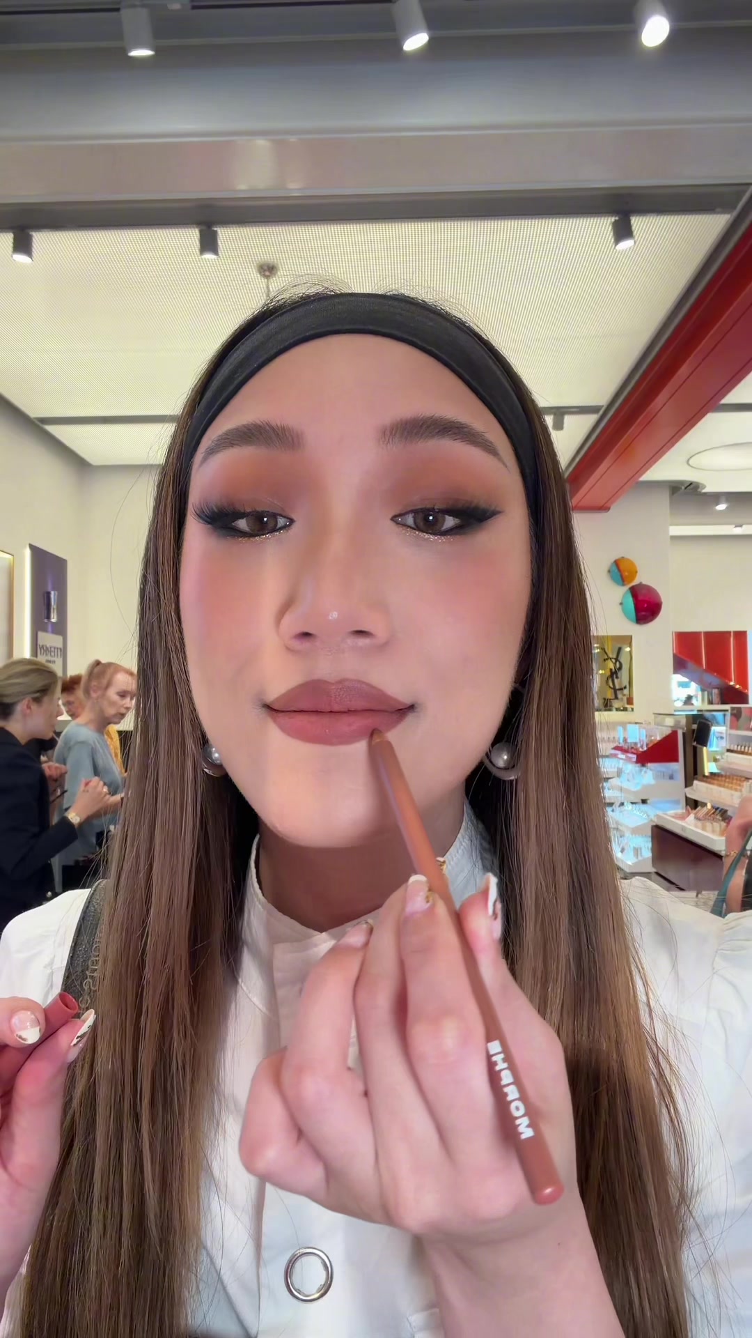 TikTok post by @janellemyh for MECCA. Caption reads: I’m coming in clutch for your Holiday gift guide....