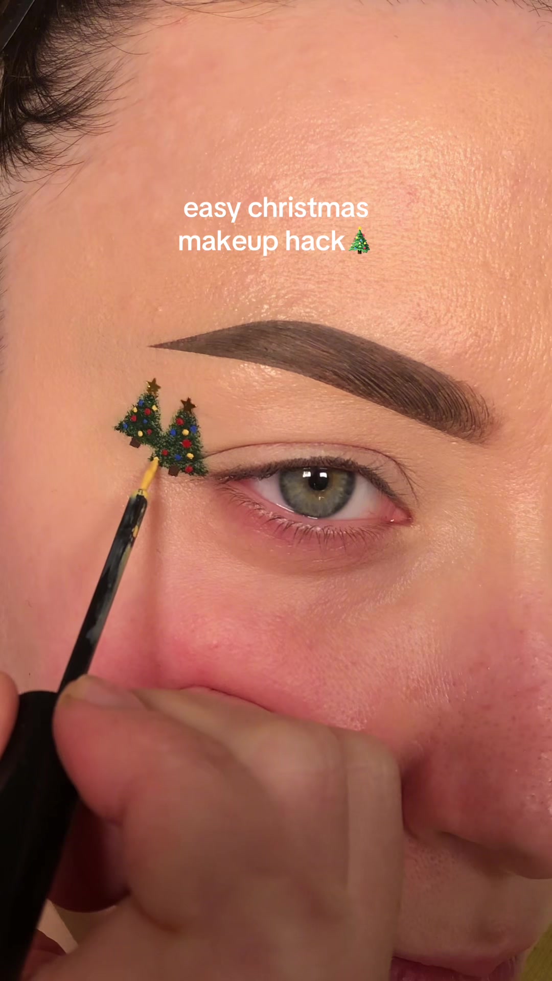 TikTok post by @alicekingmakeup for Eylure. Caption reads: fun christmas makeup hack!🎄 - thank you to....