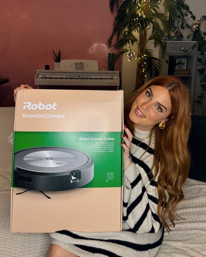 Instagram post by @evelina_nikoliza for iRobot. Caption reads: [...] την ολοκαίνουργια Roomba Combo J5 της....
