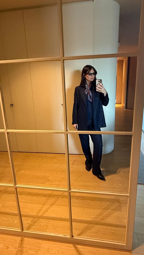 Instagram post by @isabellejunot for Carolina Herrera. Caption reads: From mom look to glow up in less than one minute....