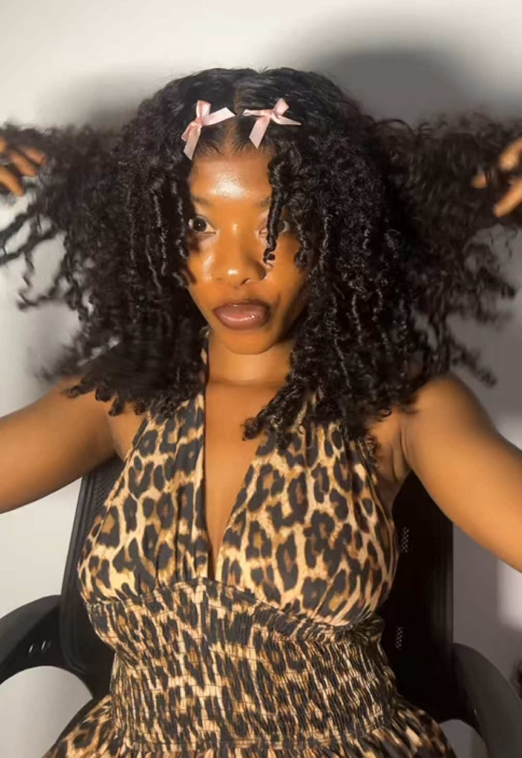 TikTok post by @wigguru for Geeta Hair. Caption reads: [...] and bouncy curls? *Get this wig from @Geeta....
