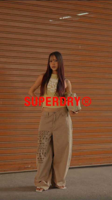 Instagram post by @suy1ngx for Superdry. Caption reads: Be the main character all summer with Superdry.....