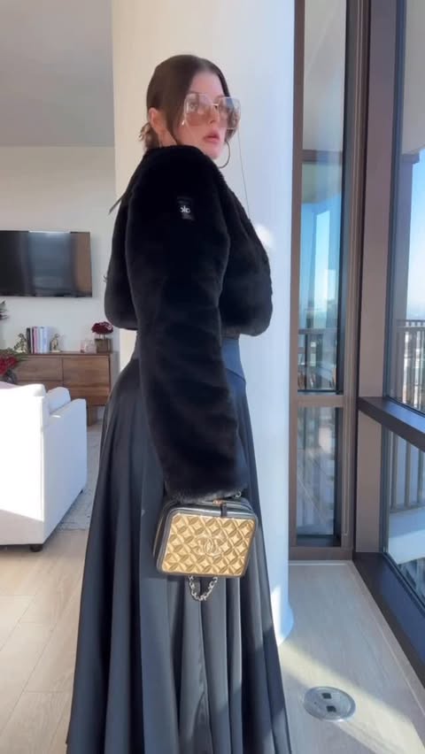 Instagram post by @julia.marie.bb for Free People. Caption reads: Comment FUR for a DM with ⛓️‍💥 info

This satin....