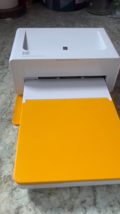 Instagram post by @lauras.family.life for Kodak Photo Printer. Caption reads: [...] Replace this text by your own....