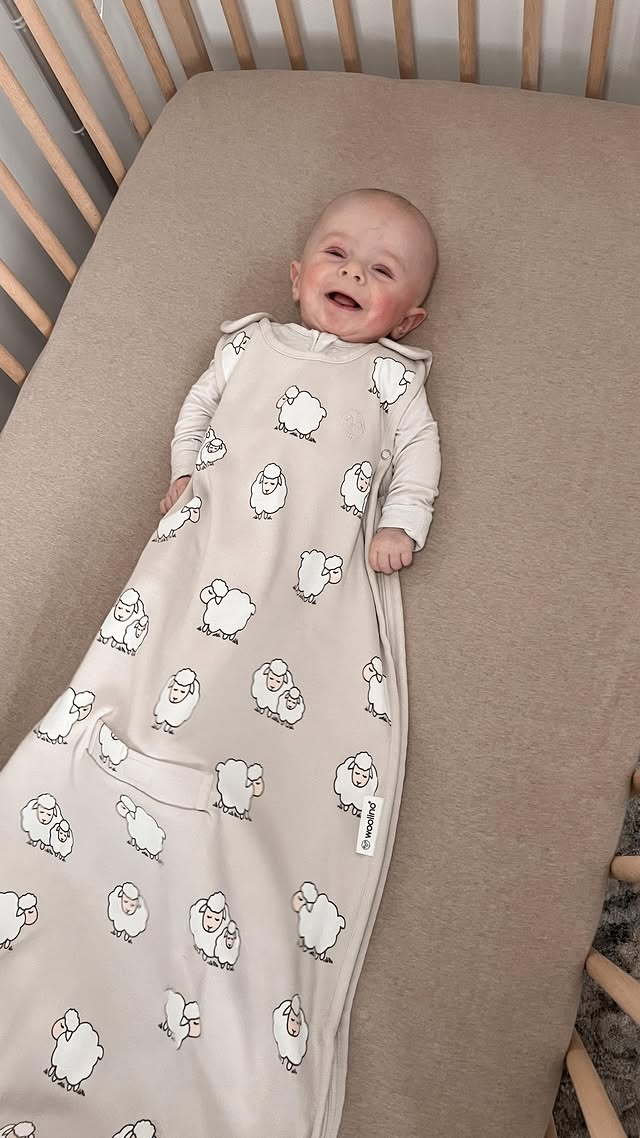 Instagram post by @jennaelizabethblog for Woolino. Caption reads: [...] River has been sleeping so good in his....