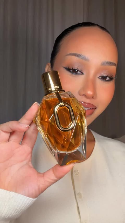 Instagram post by @taontm for rabanne. Caption reads: When perfume is your best accessory 🤍 @rabanne....