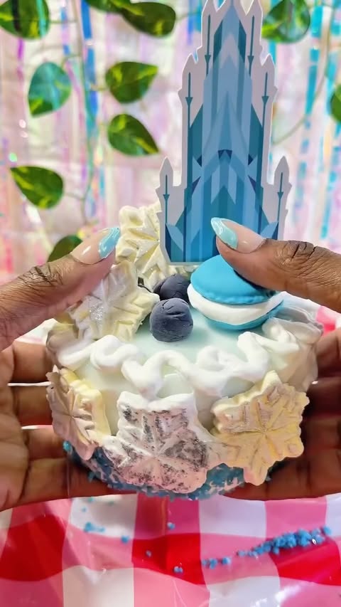 Instagram post by @playingwithayce for Zuru Toys. Caption reads: [...] Frozen DIY Slime Cake @zuru.toys #zurutoys....